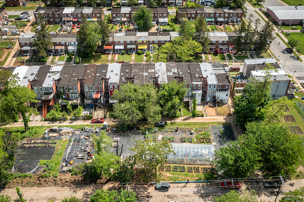 Aerial image of an urban neighborhood with community gardens and a greenhouse copyright Edwin Remsberga 